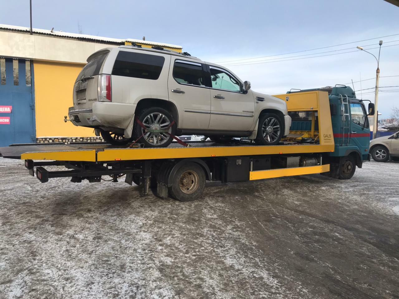 Фото перевозки джипа на эвакуаторе в Анггарске