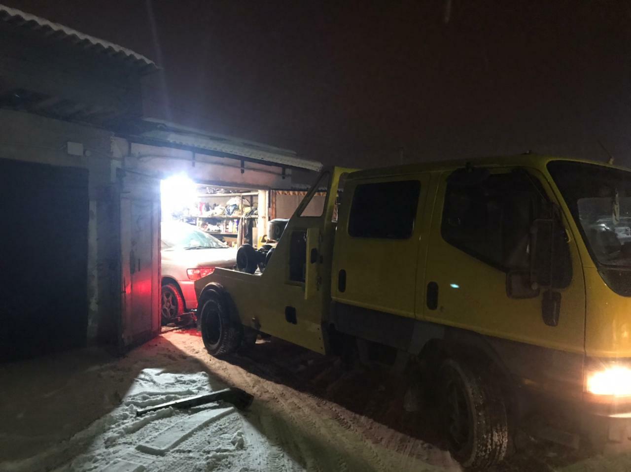 Фото эвакуации авто из гаража