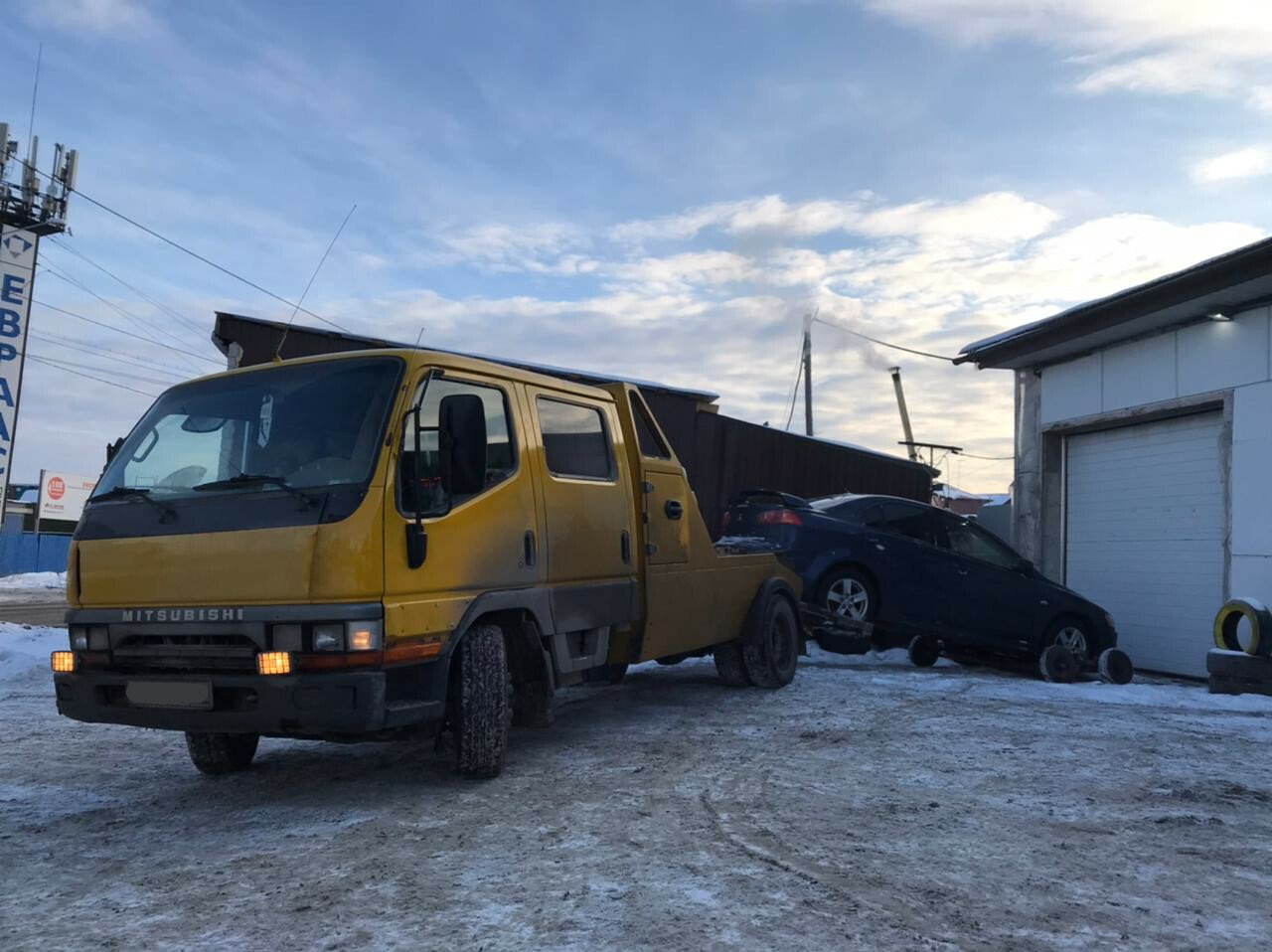 Фото эвакуации на легкового авто в Ангарске